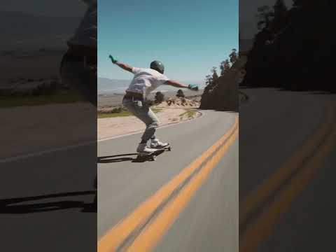 Crossing the serrated double yellow on a longboard.